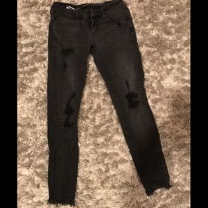 Distress black American eagle skinny jeans